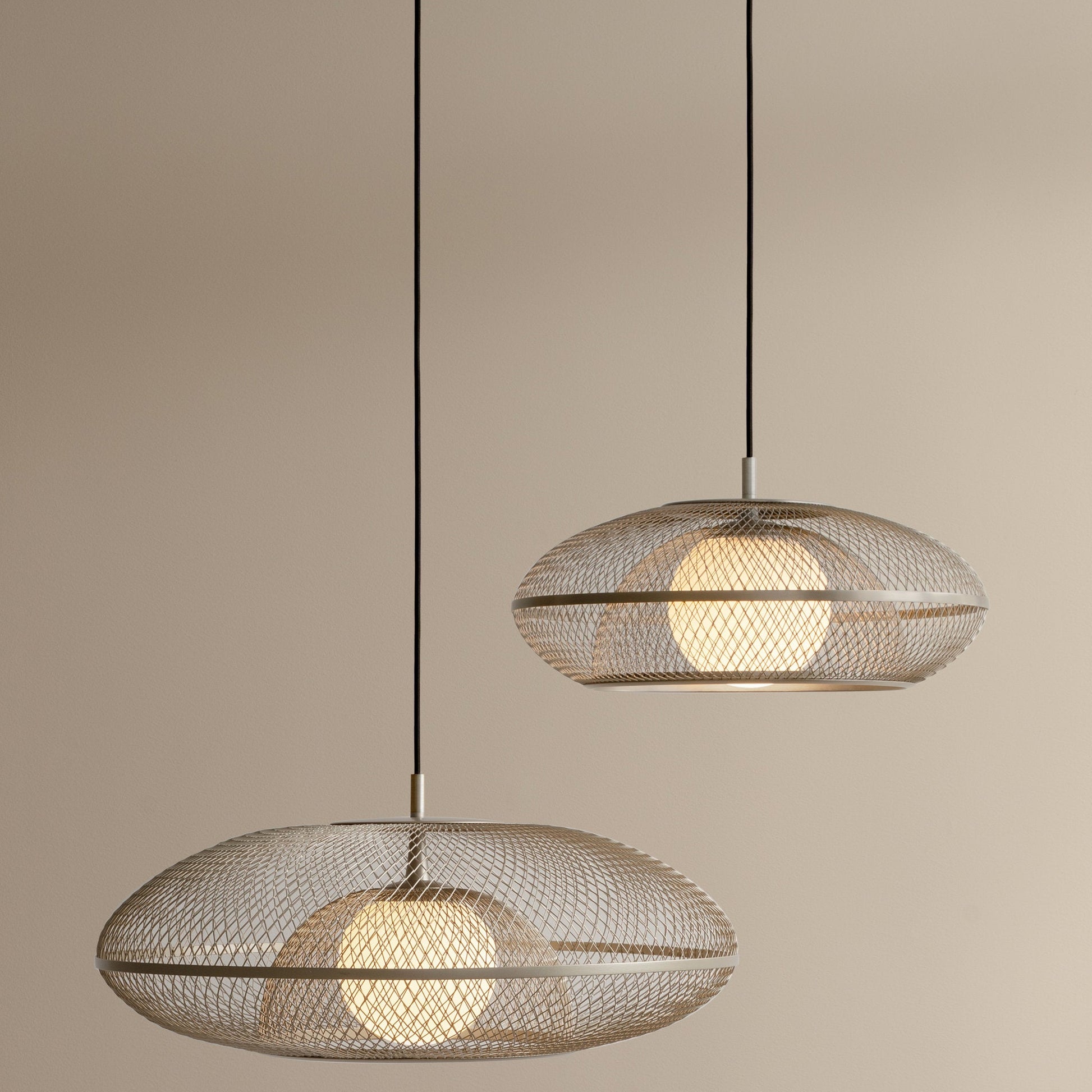 UMAGE_lifestyle_Faraday_large_brass_Faraday_medium_steel_(1).jpeg
