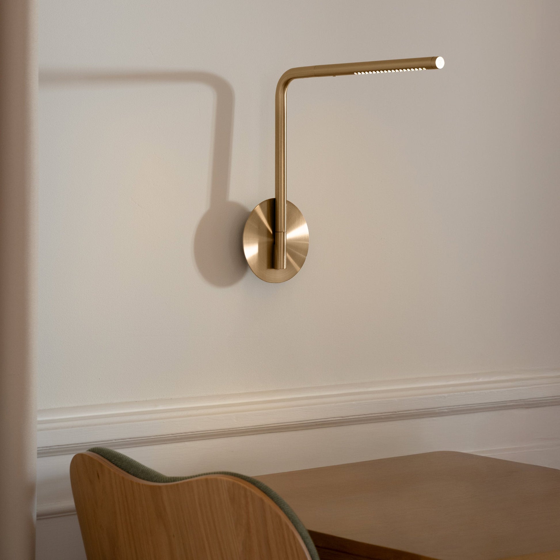 UMAGE_lifestyle_Omni Pivot_brass.jpeg