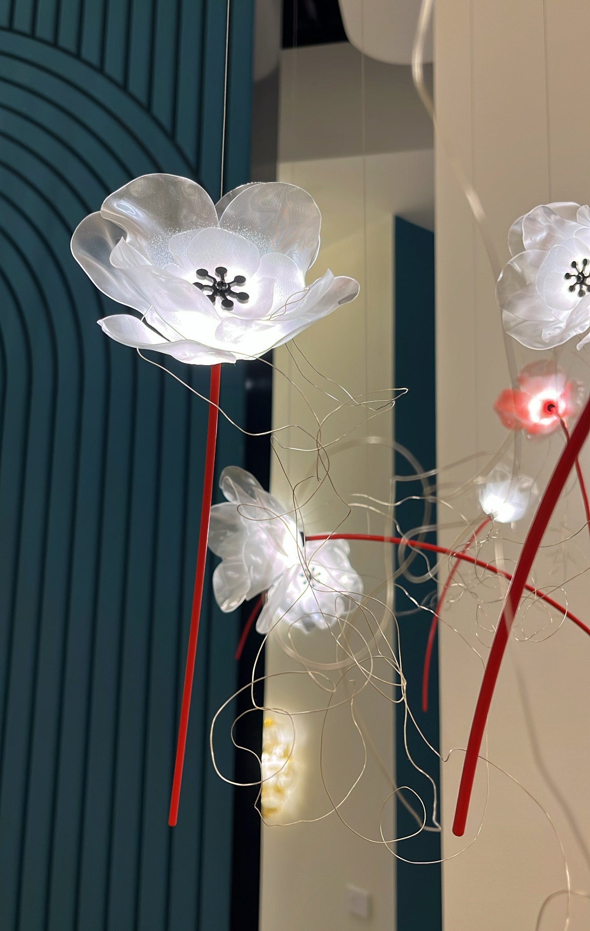 SLAMP Poppy suspension light installation